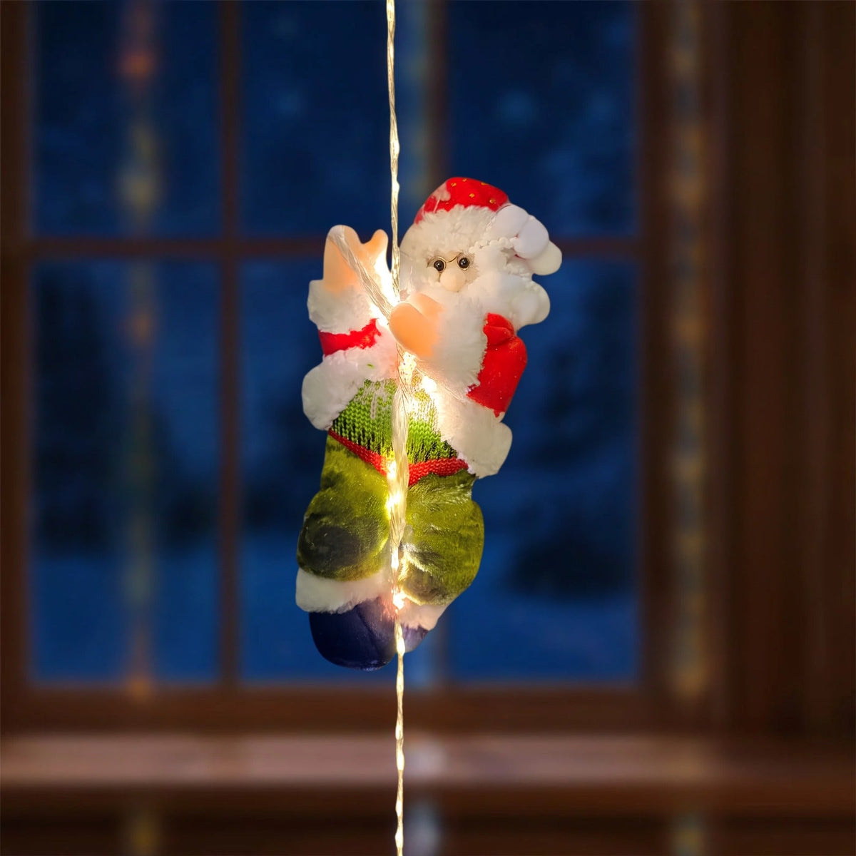 Papá Noel escalador con luces LED incorporadas